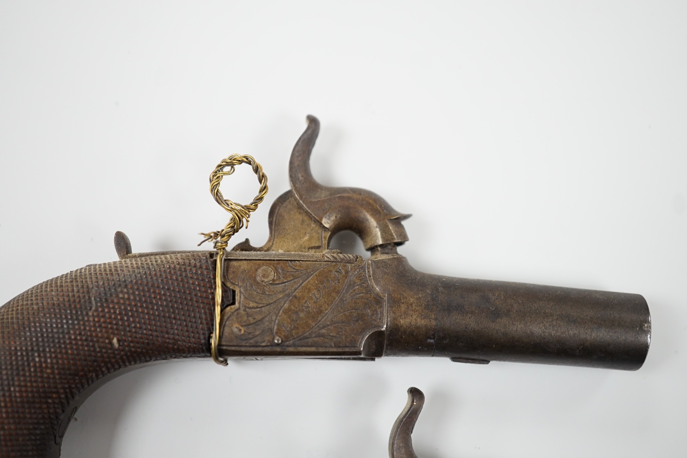 A pair of 19th century Smith of London percussion cap muff pistols, 12.5cm